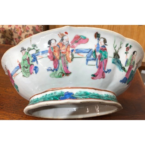 58 - A 19th Century Cantonese oval bowl with crinkle rim on white ground with multi-coloured figure decor... 