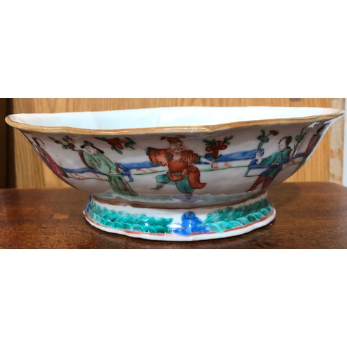 58 - A 19th Century Cantonese oval bowl with crinkle rim on white ground with multi-coloured figure decor... 