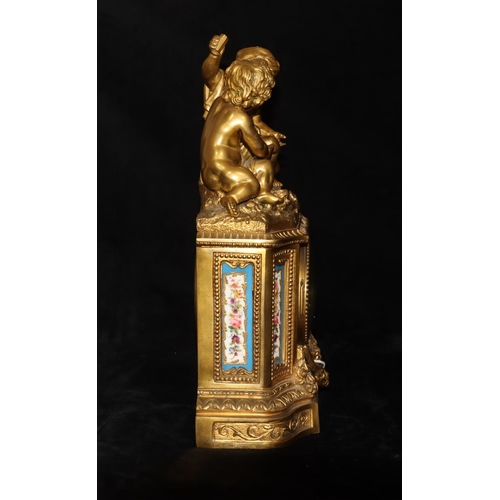 537 - Etablissement De Paris, Ormolu 8-day striking mantel clock with cupid motifs playing dice above whit... 