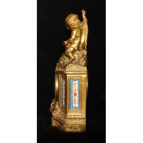 537 - Etablissement De Paris, Ormolu 8-day striking mantel clock with cupid motifs playing dice above whit... 