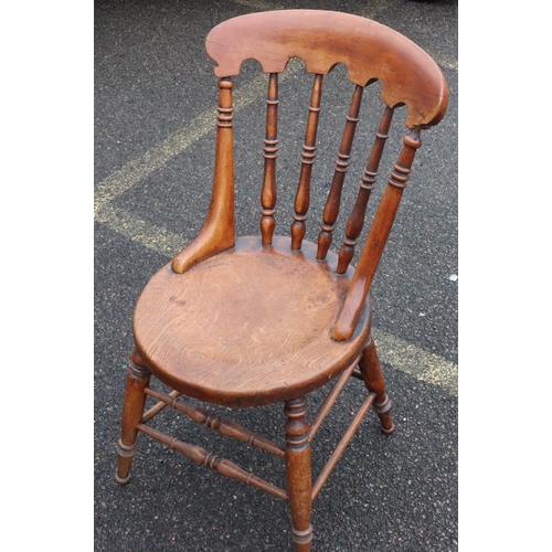 569 - A 19th Century mahogany single chair with turned stick back, circular solid seat on round turned leg... 