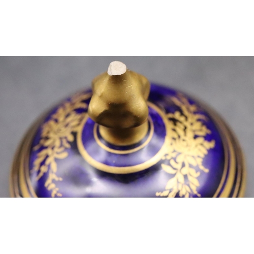 15 - A Coalport small bulbous 2-handled lidded pot on blue and cream ground with landscape and gilt decor... 