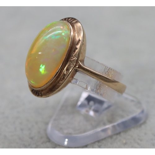 407 - A 9ct gold ladies' oval opal ring, Size L, 2.9 grams gross