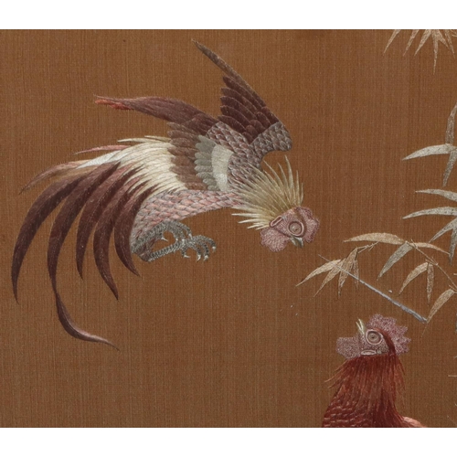 511 - An Oriental silk panel depicting 2 birds with bamboo decoration, signed, in mahogany frame, 50.5cm x... 