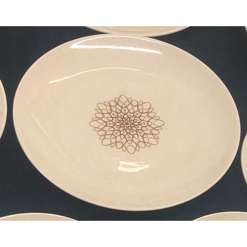 1003 - A Royal Doulton Desert Star 6-place dinner service,1 serving platter, 2, serving dishes, 1 lid, 6 di... 