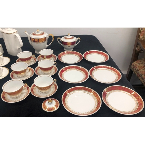 1005 - A Royal Worcester set of 8 coffee cups and 6 saucers, a Royal Doulton 