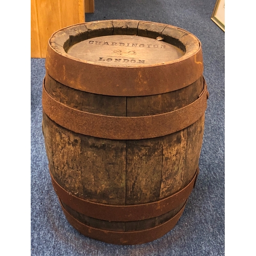 1030 - An oak Charrington London barrel numbered 49, 42.5cm high, 30cm diameter.