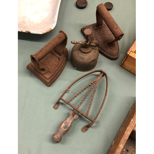 1039 - A set of old kitchen scales with weights, 3 wooden cutlery trays, 2 vintage box irons and 1 stand et... 