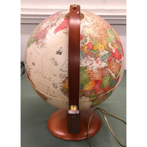 1052 - A modern globe with bulb to interior, 47cm high overall (bulb not working).