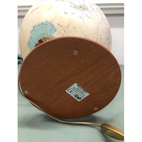 1052 - A modern globe with bulb to interior, 47cm high overall (bulb not working).