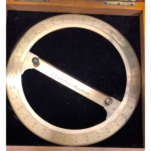 1080 - A brass J Casartelli full circle brass protractor in wood case, a Zero Settings Air meter in wood ca... 