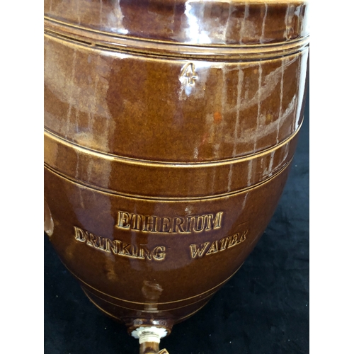 1088 - A stoneware Etherium Drinking Water barrel, 42cm high