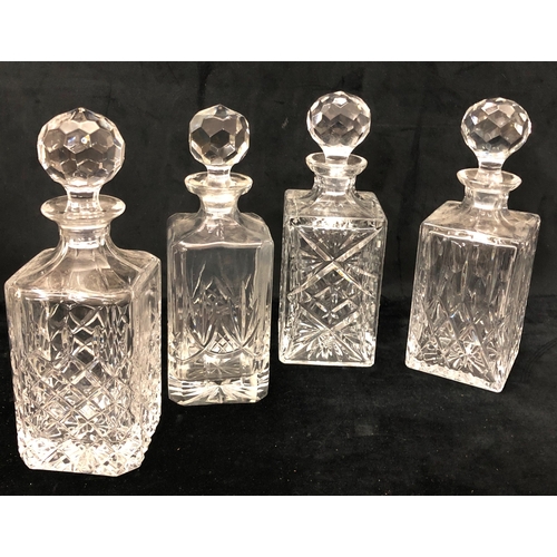 1094 - 12 various cut-glass decanters (2 stoppers missing) and 1 jug.