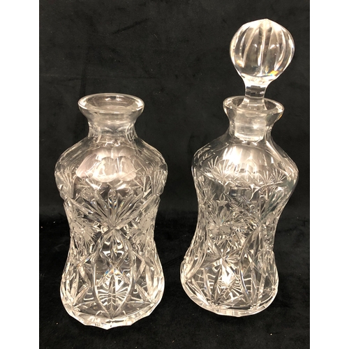 1094 - 12 various cut-glass decanters (2 stoppers missing) and 1 jug.