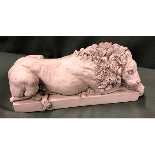 1121 - A composition figure of a lion, 23cm long, 10cm high, a stone bowl, 26.5cm diameter, a stone fish, 1... 