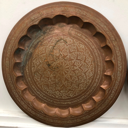 1127 - 2 large brass wall plates (non-matching), 55.5cm diameter