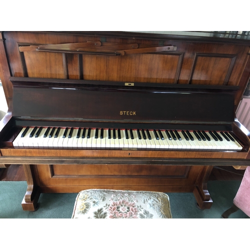 1159 - A Steck upright piano, 144cm wide, 64cm deep, 122cm high (light wear to veneer to top) and a piano s... 