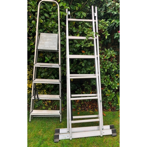 1173 - A wooden extendable ladder with 2 sections 245cm to each section and 2 other aluminium ladders. This... 