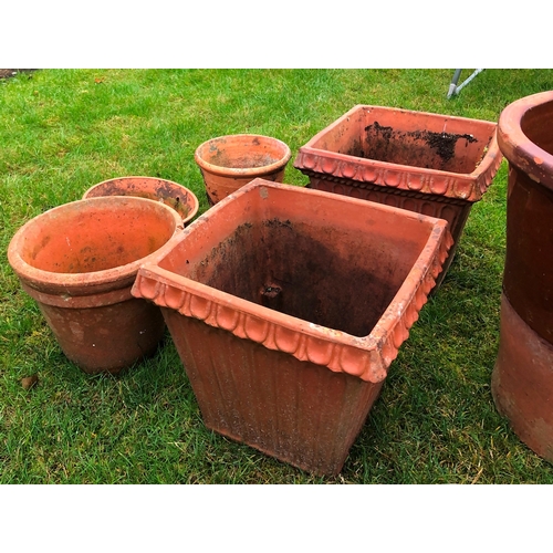 1181 - A group of terracotta planters, tallest 48cm high, 47cm diameter, (slight weathering and 1 slight cr... 