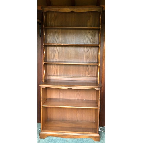 1187 - A vintage Ercol pale blonde open bookcase, 83cm wide, 37cm deep, 193cm high. This item is not held b... 