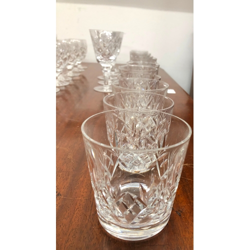 1197 - A set of crystal cut glasses, 6 glasses per size and 6 tumblers, 1 matching jug and 6 other tumblers... 