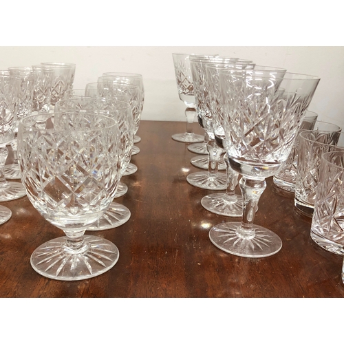 1197 - A set of crystal cut glasses, 6 glasses per size and 6 tumblers, 1 matching jug and 6 other tumblers... 