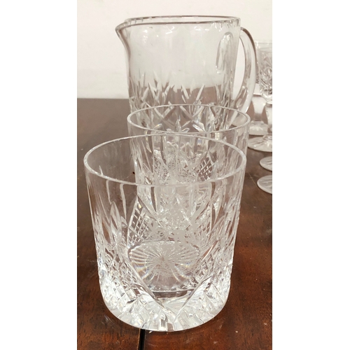 1197 - A set of crystal cut glasses, 6 glasses per size and 6 tumblers, 1 matching jug and 6 other tumblers... 