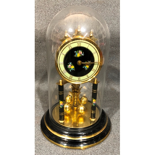 1201 - An anniversary clock with glass dome 30cm high overall.