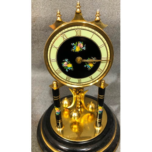 1201 - An anniversary clock with glass dome 30cm high overall.