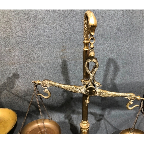 1207 - A set of brass scales, 58cm high overall (1 weight missing) and another set of wrought iron scales 4... 