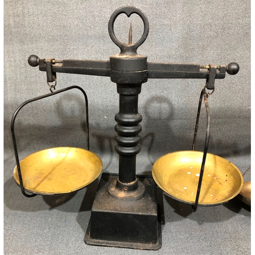 1207 - A set of brass scales, 58cm high overall (1 weight missing) and another set of wrought iron scales 4... 