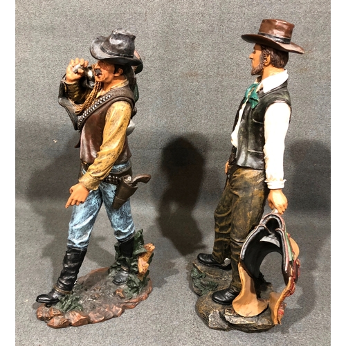 1210 - A pair of composition cowboy figures, tallest 48cm high.