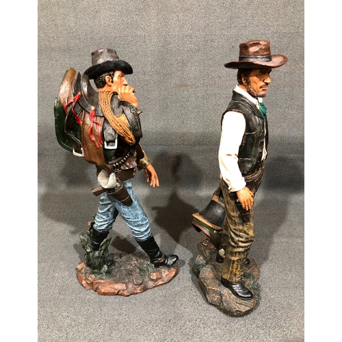 1210 - A pair of composition cowboy figures, tallest 48cm high.