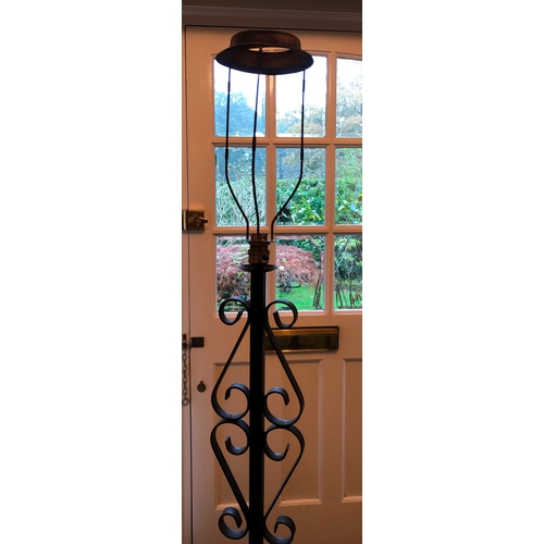 1225 - A black metallic floor lamp, 136cm high and a similar plant stand, 90cm high. This item is not held ... 