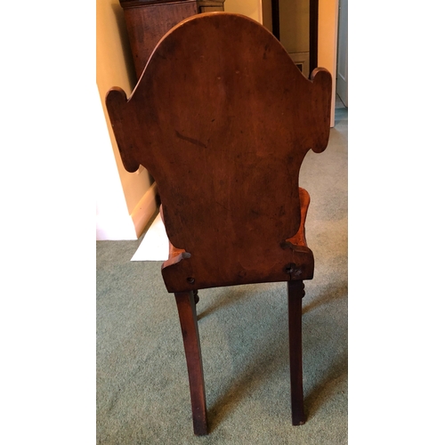 1228 - A small oak chair, 87cm high, seat 40cm high  (small split to back). This item is not held by PF Win... 