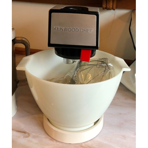 1234 - A Kenwood mixer with 1 plastic bowl, 1 metal bowl, balloon whisk, beater and liquidiser, model A901,... 