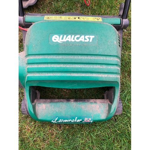 1236 - A Flymo Micro Lite electric mower and a Qualcast electric scarifier. This item is not held by PF Win... 