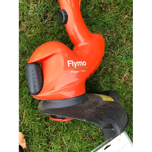 1239 - A Flymo Power Trim strimmer and a Stihl strimmer. This item is not held by PF Windibank, Collection ... 