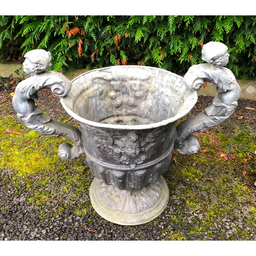 1244 - A Bulbeck Foundry lead 2-handled planter, 33cm diameter, 34cm high and a lead waterspout, 115cm high... 