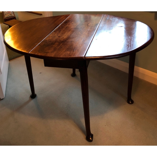 1247 - A mahogany drop leaf Pembroke table, oval top 95cm wide, 113cm long, 71cm high (some ring marks to t... 