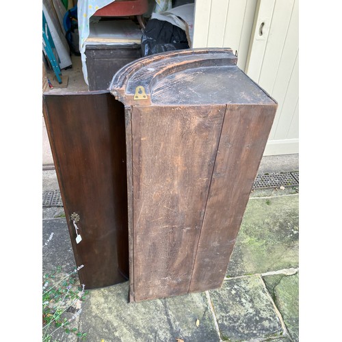 1256 - A George III mahogany bow fronted hanging corner cupboard, 71cm wide, 50cm deep, 106cm high. (Lock r... 