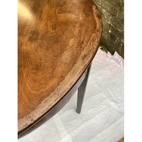 1259 - A demi lune mahogany table 105cm wide, 48cm deep, 71cm high (1 leg repaired and loose, water stain a... 