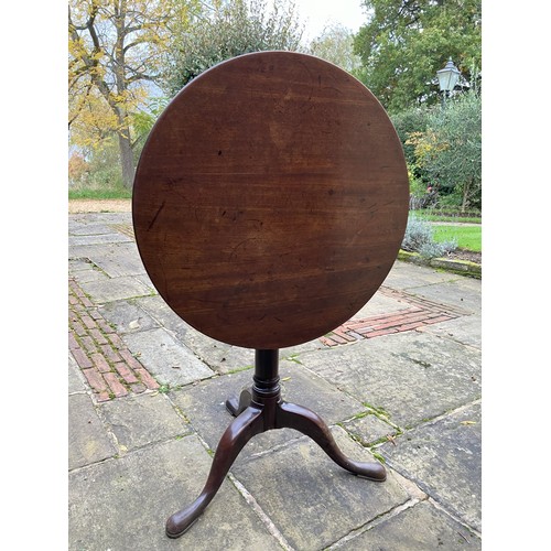 1260 - A mahogany circular occasional table, 70cm diameter, 70cm high (steel plate to leg support and small... 