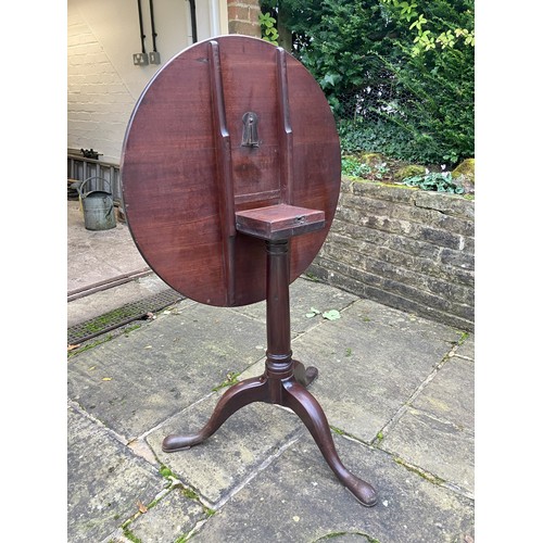 1260 - A mahogany circular occasional table, 70cm diameter, 70cm high (steel plate to leg support and small... 