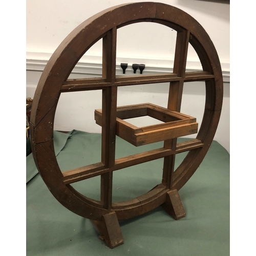 1031 - A circular wood framed fire screen/window frame with central swivel panel, 63cm high 61cm diameter a... 