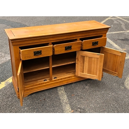 1066 - A JB Global oak sideboard with 3 drawers enclosing shelf to interior 138.5cm wide, 43cm deep, 83cm h... 