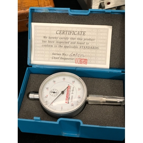 1080 - A brass J Casartelli full circle brass protractor in wood case, a Zero Settings Air meter in wood ca... 