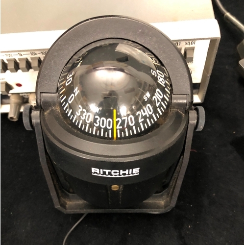 1080 - A brass J Casartelli full circle brass protractor in wood case, a Zero Settings Air meter in wood ca... 