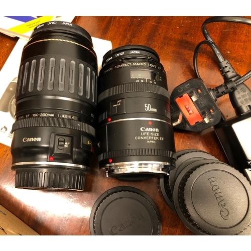 1155 - A quantity of various cameras, including a Canon Eos with Zoom 18-55mm lens, a Canon Compact-Macro 5... 