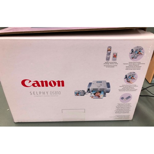 1301 - A Canon Selphy DS810 compact photo printer (as new), boxed and a Roberts Rambler BT Sterio radio.